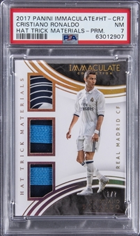 2017 Panini Immaculate Collection Hat Trick Materials Premium #HT-CR7 Cristiano Ronaldo Triple Patch Card (#1/7) - PSA NM 7
